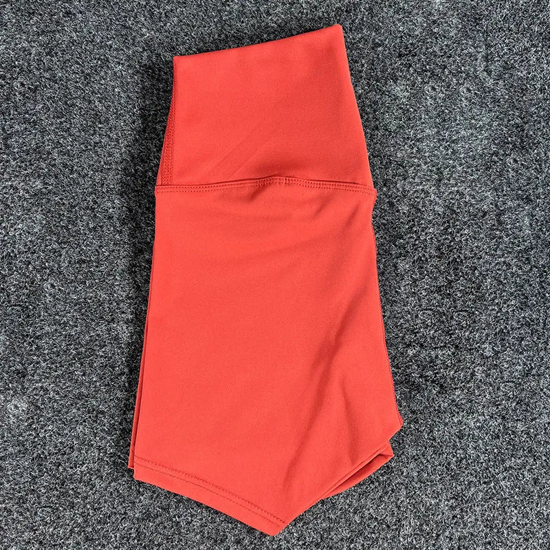 Women's high-waisted nylon yoga shorts in various colours suitable for running, sports, and cycling