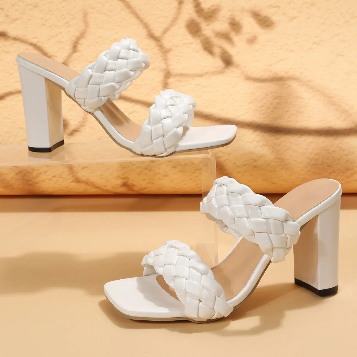 Women's square toe flip flops with chunky heel and woven twisted upper in apricot colour.