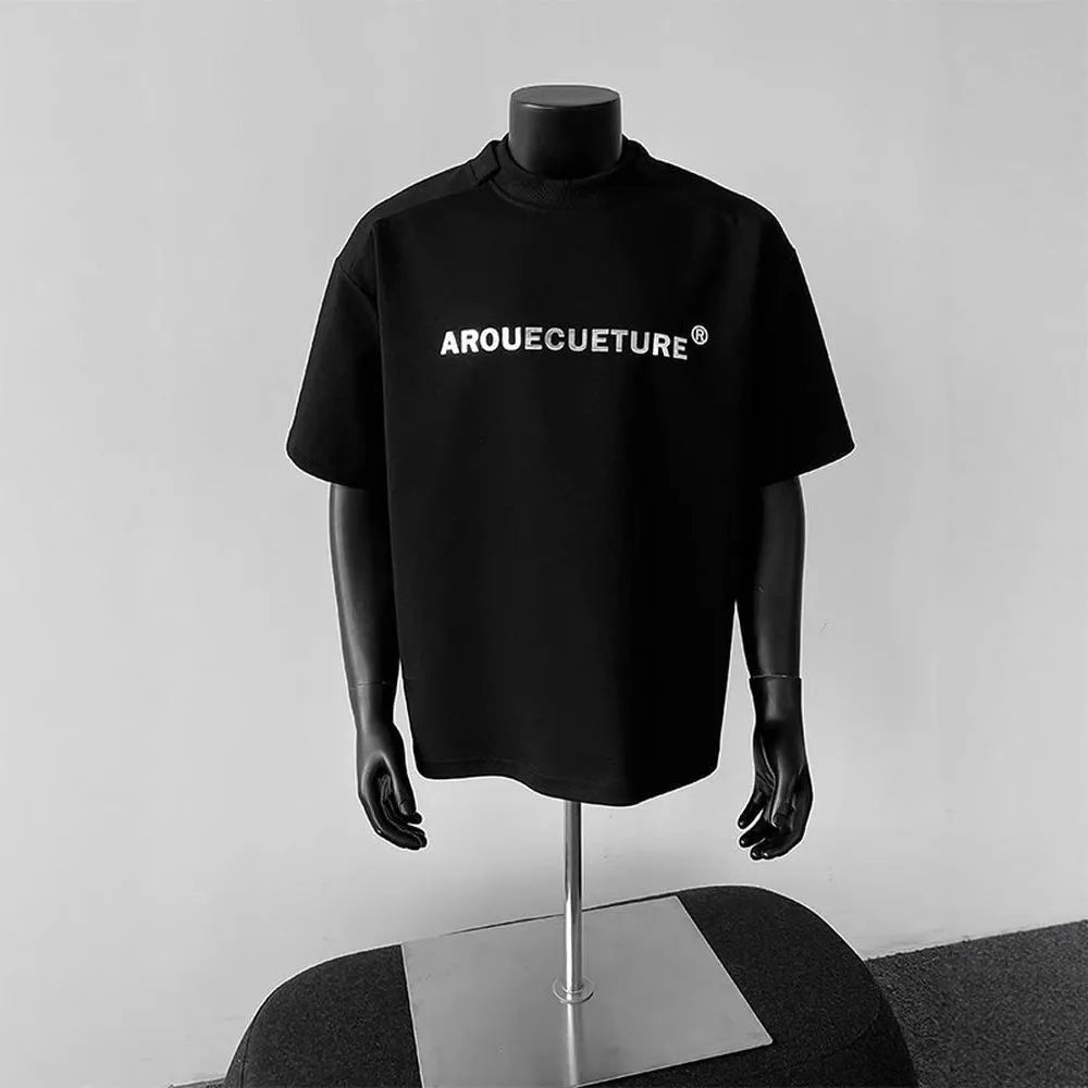 Men's loose fit cotton t-shirt with a printed letters pattern in light grey