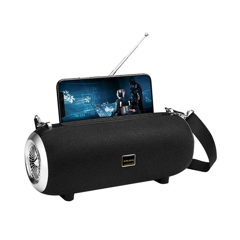 F666 portable Bluetooth speaker in chosen colour with shoulder strap, showing front grille and control buttons.