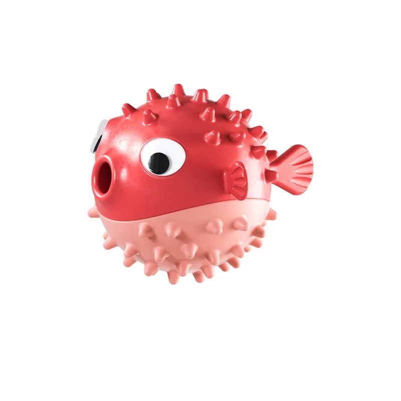 Green fish-shaped dog chew toy with raised surface particles for medium and large breed dogs