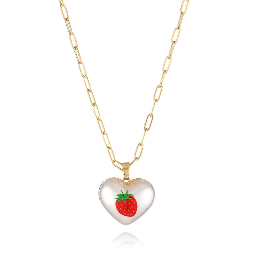 Adjustable girls necklace with a choice of apple, cherry, pear, pineapple, or strawberry heart-shaped pendant.