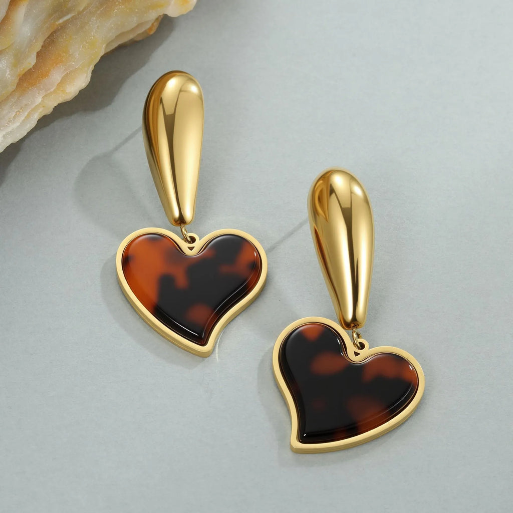 Women's tortoiseshell resin finish earrings with heart or flower designs in 18K gold electroplated stainless steel