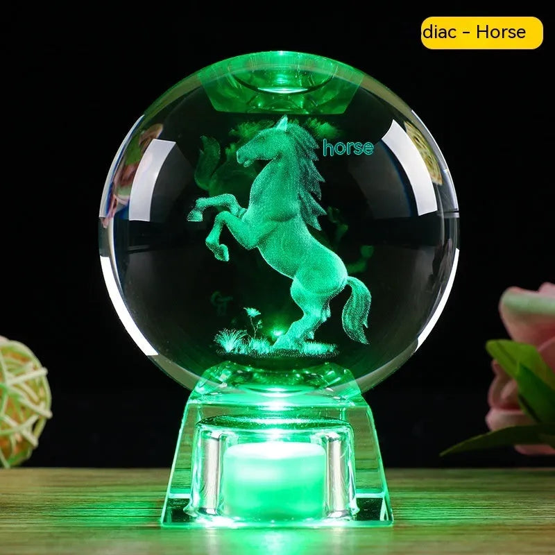 Chinese zodiac crystal ball lamp with electronic charging base showing animal design