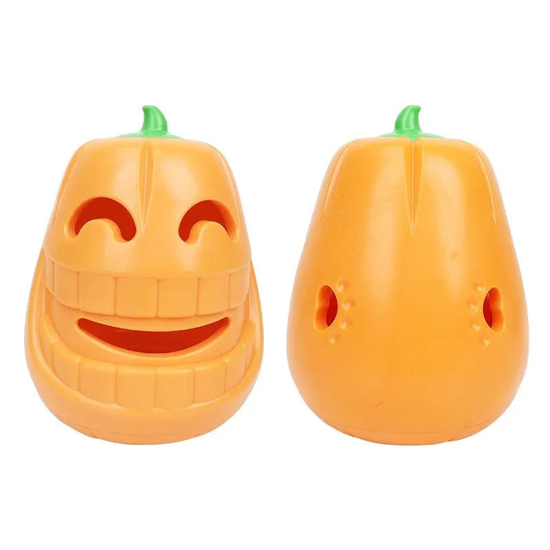 Orange Halloween pumpkin shaped interactive dog chew toy with a treat dispensing funnel.
