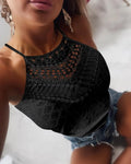 Women's polyester sleeveless solid colour hollow lace halter top on plain background
