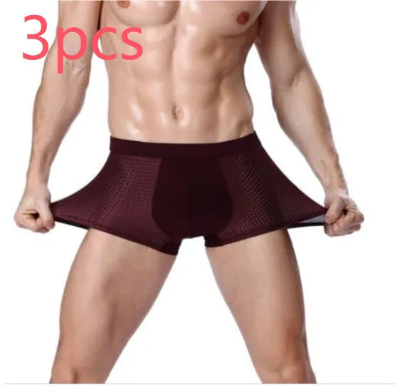 Men's solid colour ice silk modal boxer briefs showing U convex design on a mid waist.