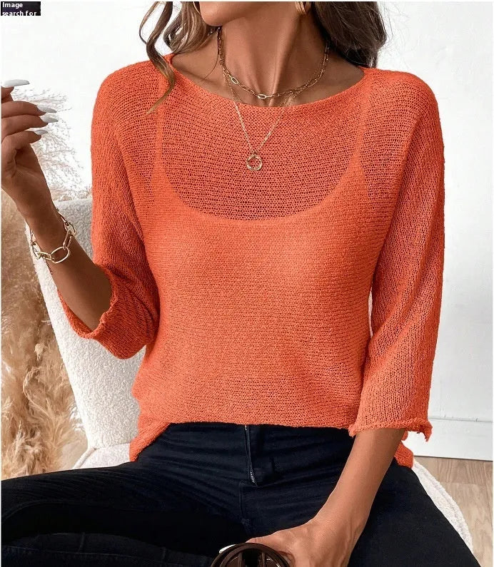 Women's off-shoulder knitted pullover top in lavender purple with a 3D pattern and 3/4 length sleeves.