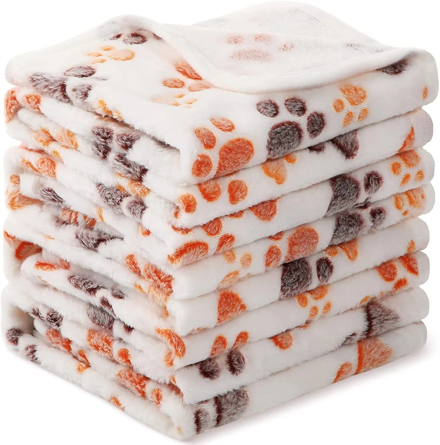 Coral fleece dog blanket with paw print design, shown in camel colour, laid flat.