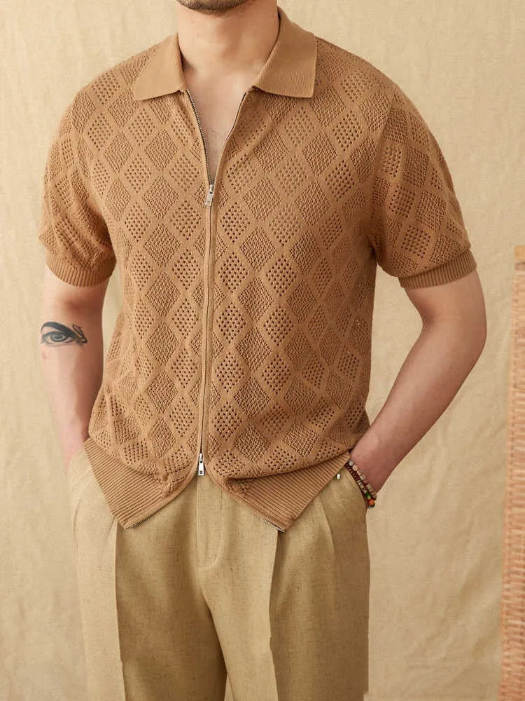 Light coffee coloured zip-front cardigan with short sleeves and a lapel collar laid flat.