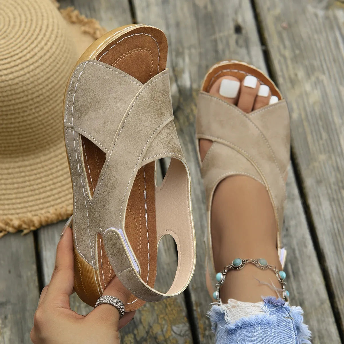 Roman platform sandals with decorative skirt and velcro closure in earth-tone colour