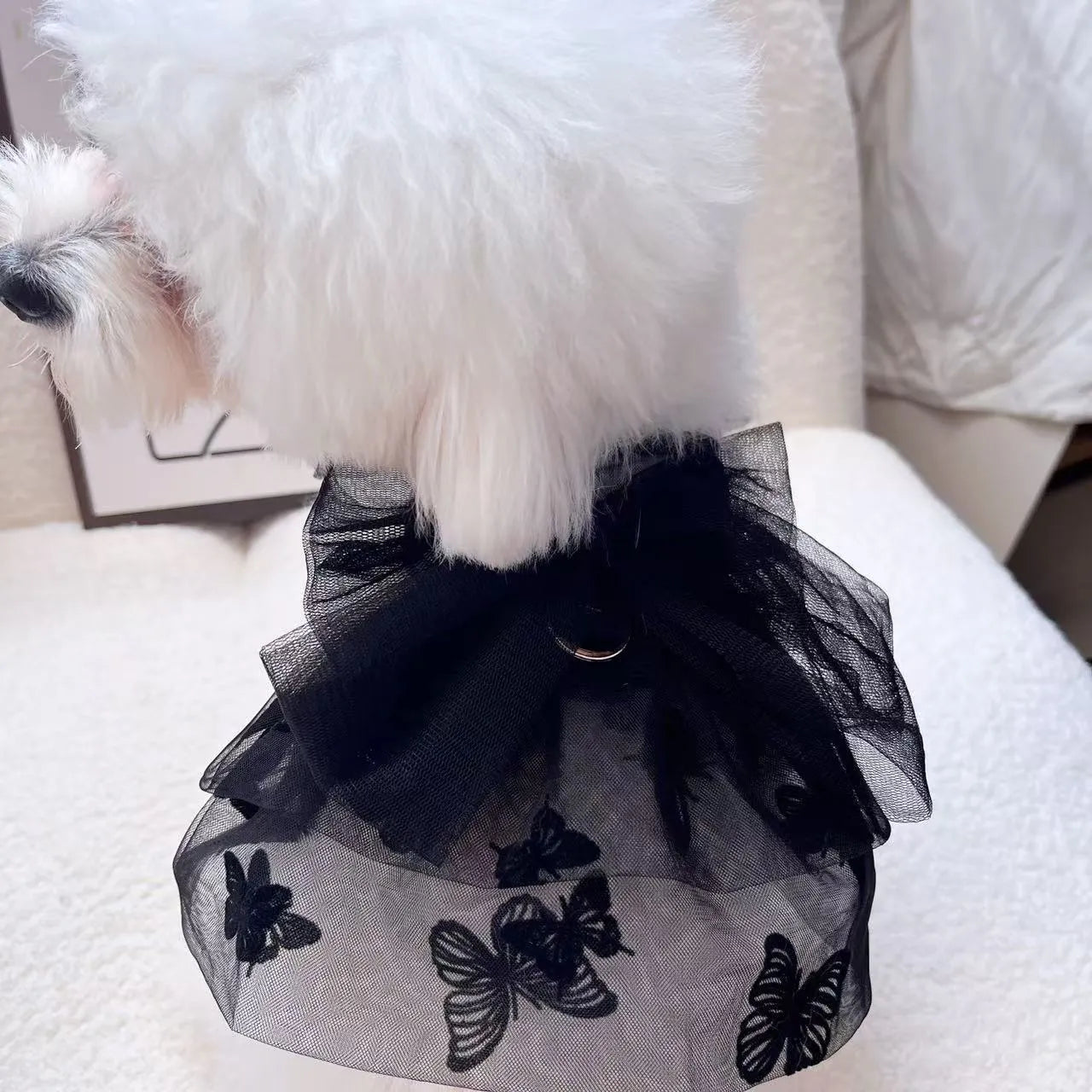 Black polyester princess tulle skirt for small dogs and cats with size chart showing chest and back measurements
