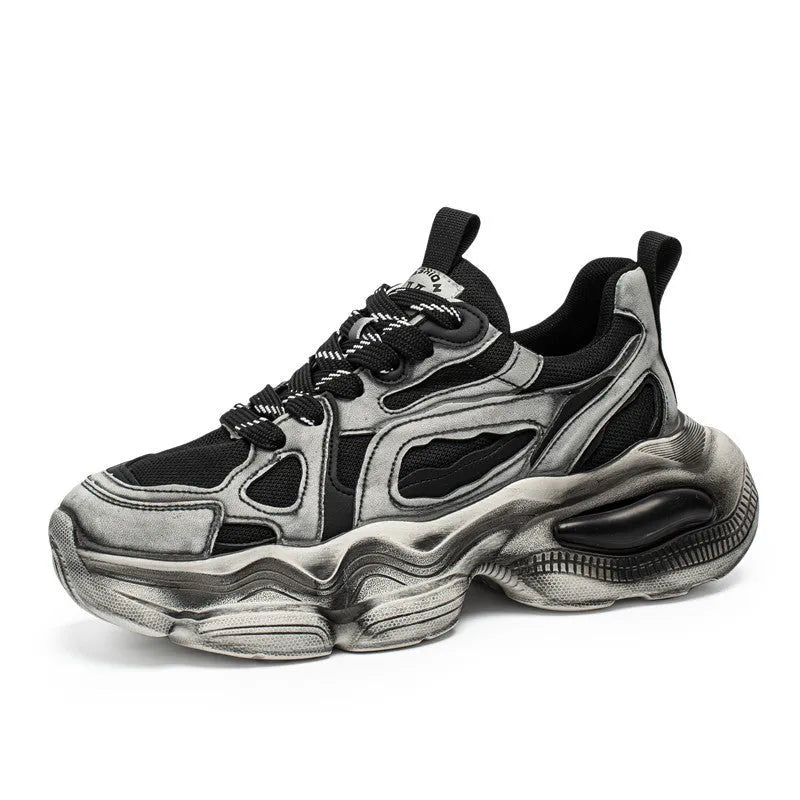 Men's black mesh sneakers with brush colour pattern, platform heel, and lace-up front.