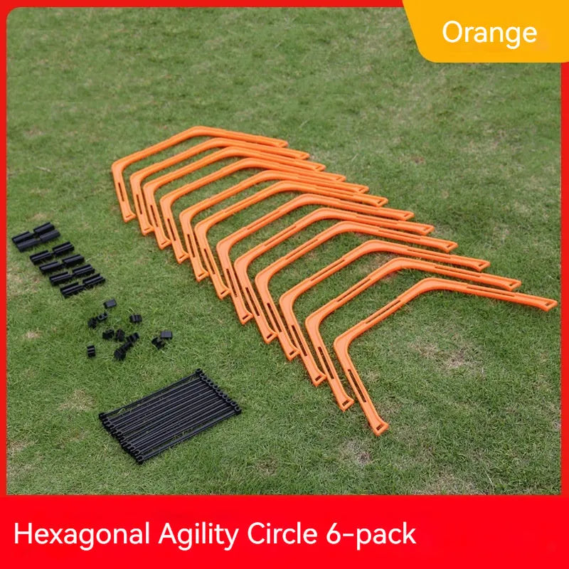 Six foldable yellow, green, and orange hexagon football agility training rings laid out on grass.