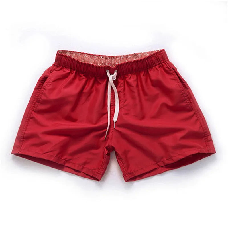 Men's plus size straight-leg beach shorts in multiple colours on a size chart.