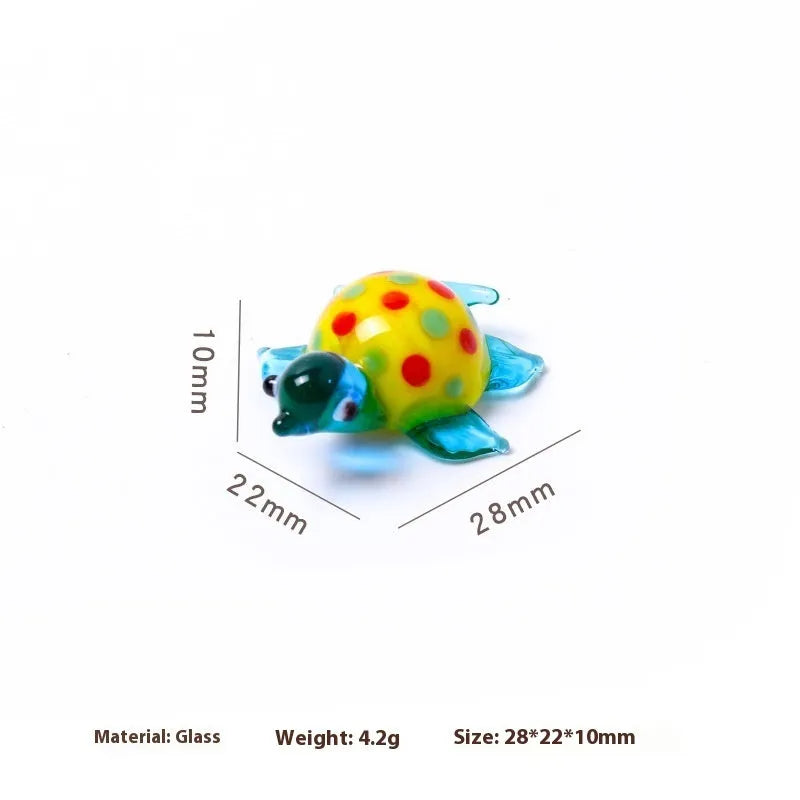Geometric glass turtle desktop ornament in modern simplicity style on a wooden surface.