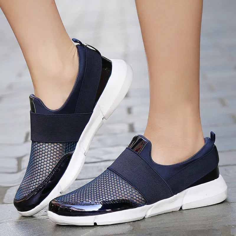 Blue, black, and grey women's low-cut sneakers with breathable mesh and a PU midsole