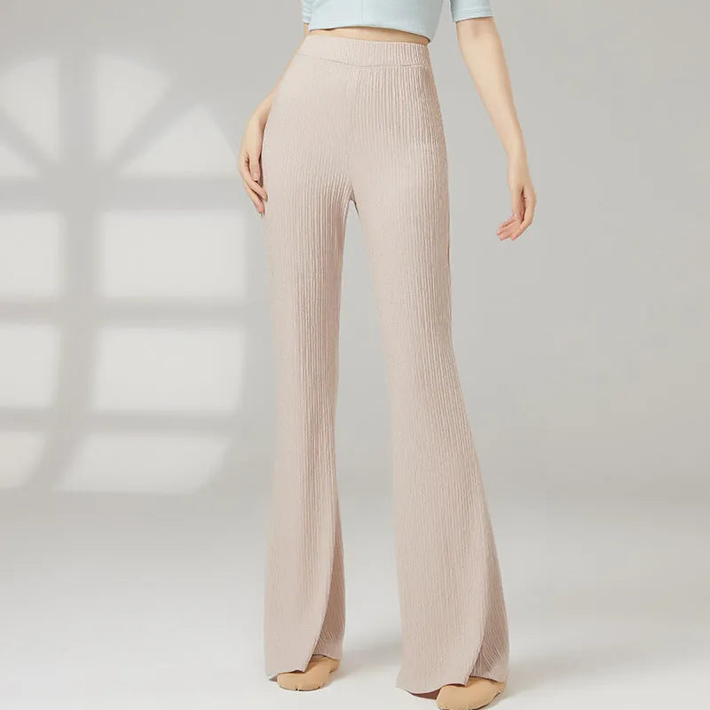 Women's solid colour dance practice trousers in polyester fabric for ballet training.