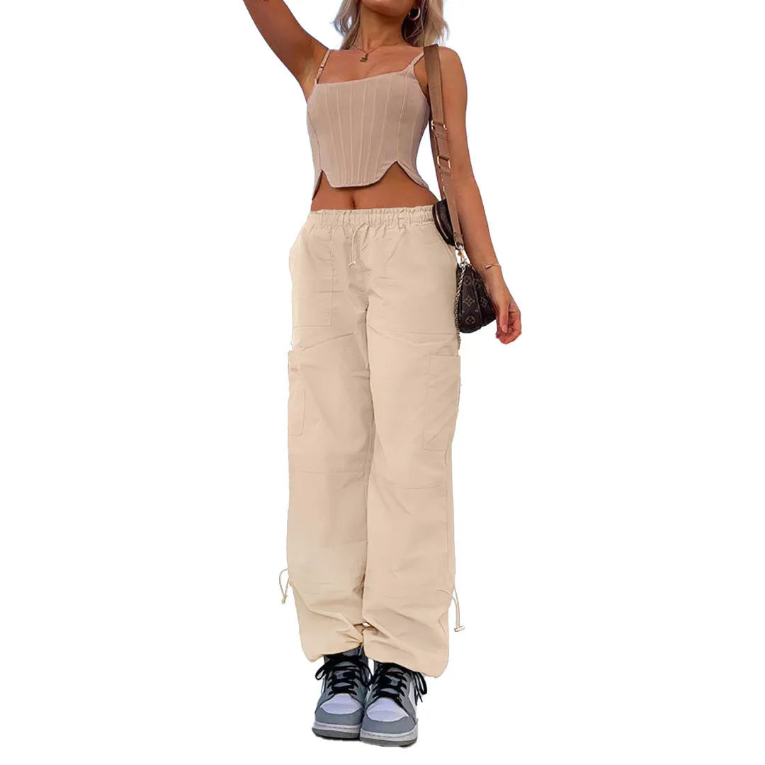 Men's straight-leg cargo trousers in khaki with multiple pockets, showing loose fit and mid-waist design