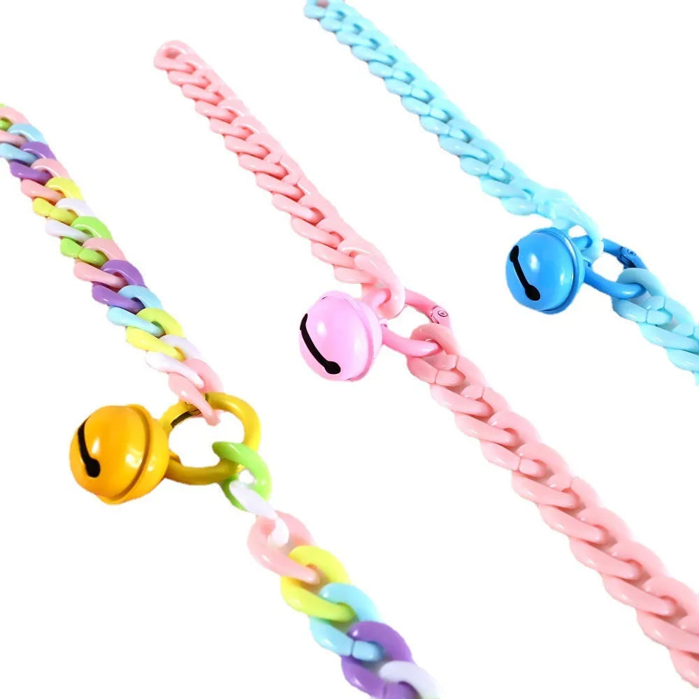 Plastic monochrome chain pet collar shown in chain blue, pink, and mixed colours for S and M sizes.