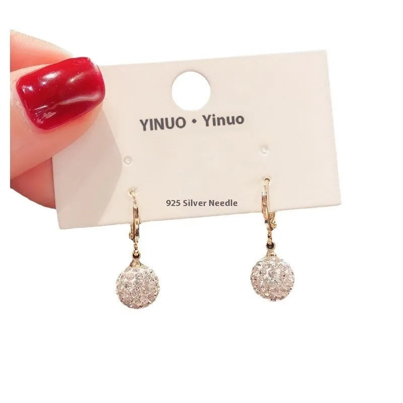 Geometric rose detail zircon earrings for women in copper, available in multiple colours.