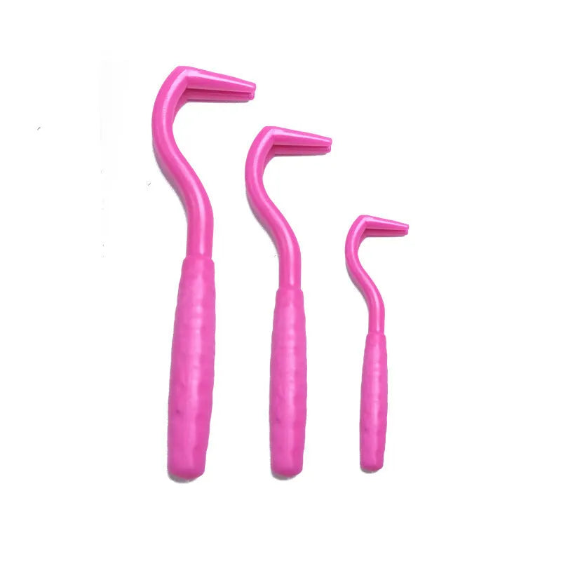 Set of three pet tick removal hooks in various colours for dogs