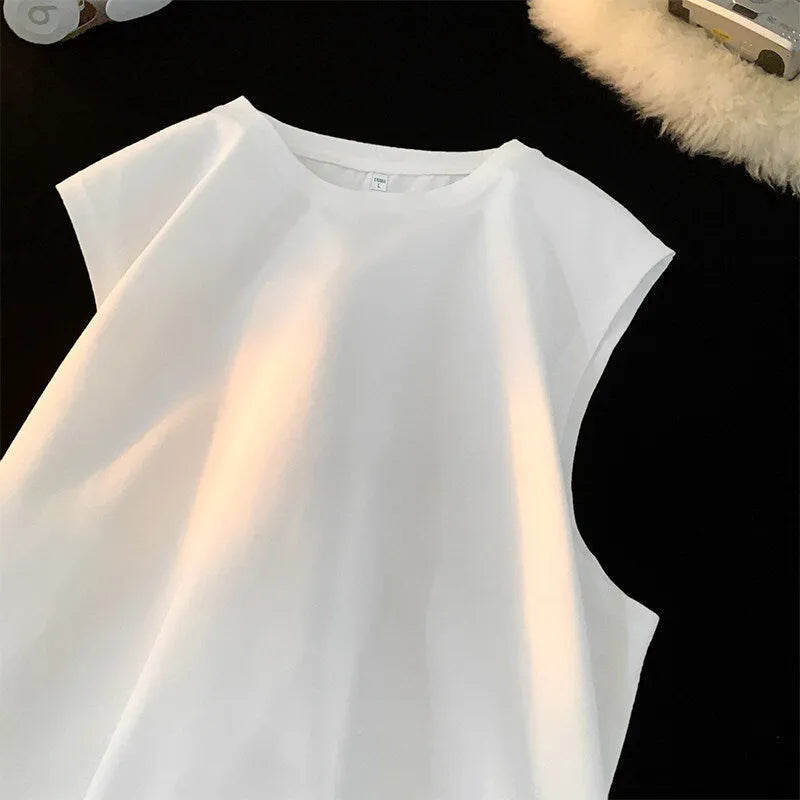 Men's loose solid colour cotton tank top sleeveless t-shirt on a hanger.