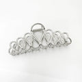 Minimalist large alloy hair clip with electroplated gold or silver finish and tassel detailing for thick hair