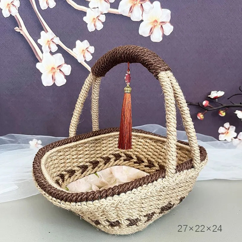 Hand-woven hemp rope basket in rustic coffee brown colour, measuring 19cm by 12cm.