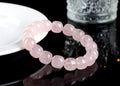 Pink bamboo crystal bracelet with 11-12mm barrel beads and geometric elements