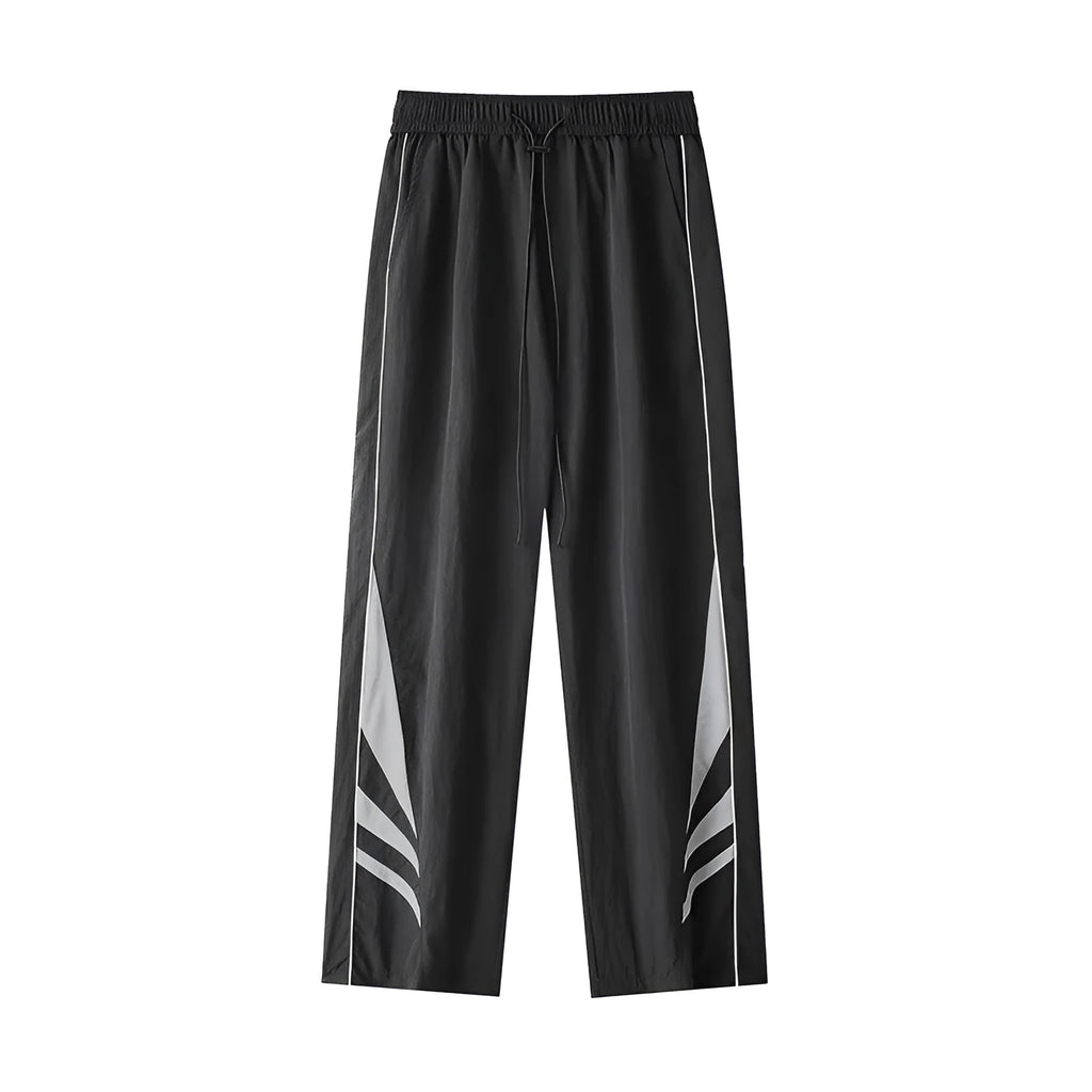 Men's straight-leg sports trousers in black with elastic waistband and button front