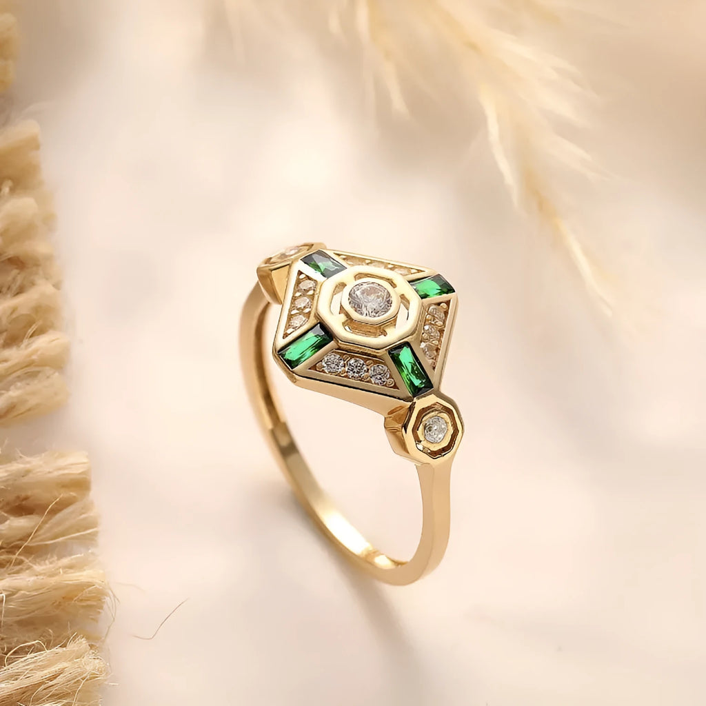 Square geometric ins style women's ring in lvzuan colour on a plain background.