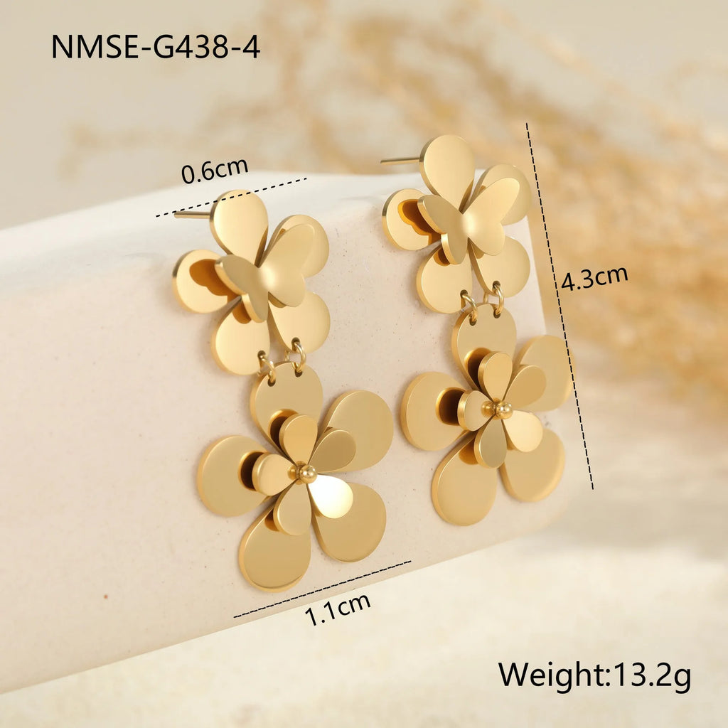 Gold electroplated stainless steel earrings with flower and butterfly designs for women
