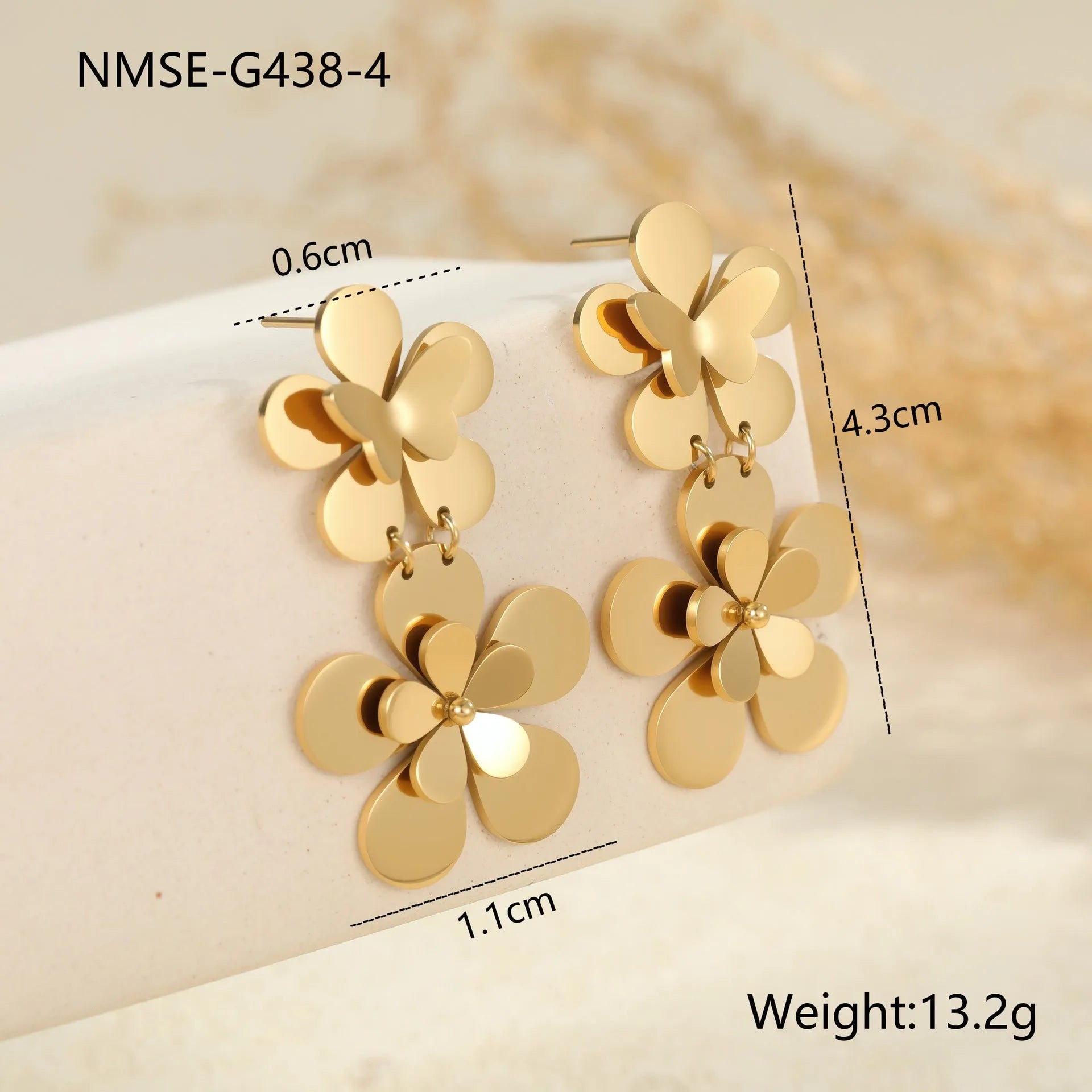 Gold electroplated stainless steel earrings with flower and butterfly designs for women