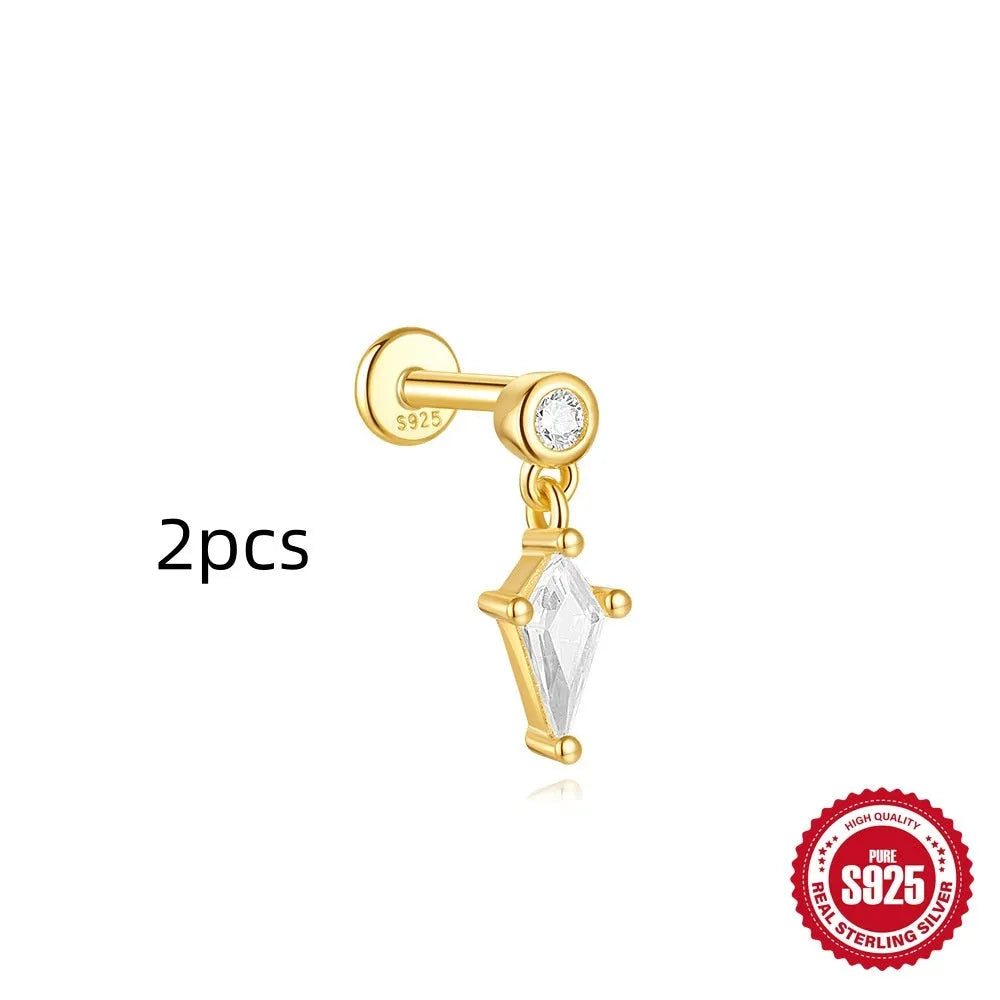 Geometric kite-shaped sterling silver earrings with a gold electroplated chain tassel featuring rhinestones.
