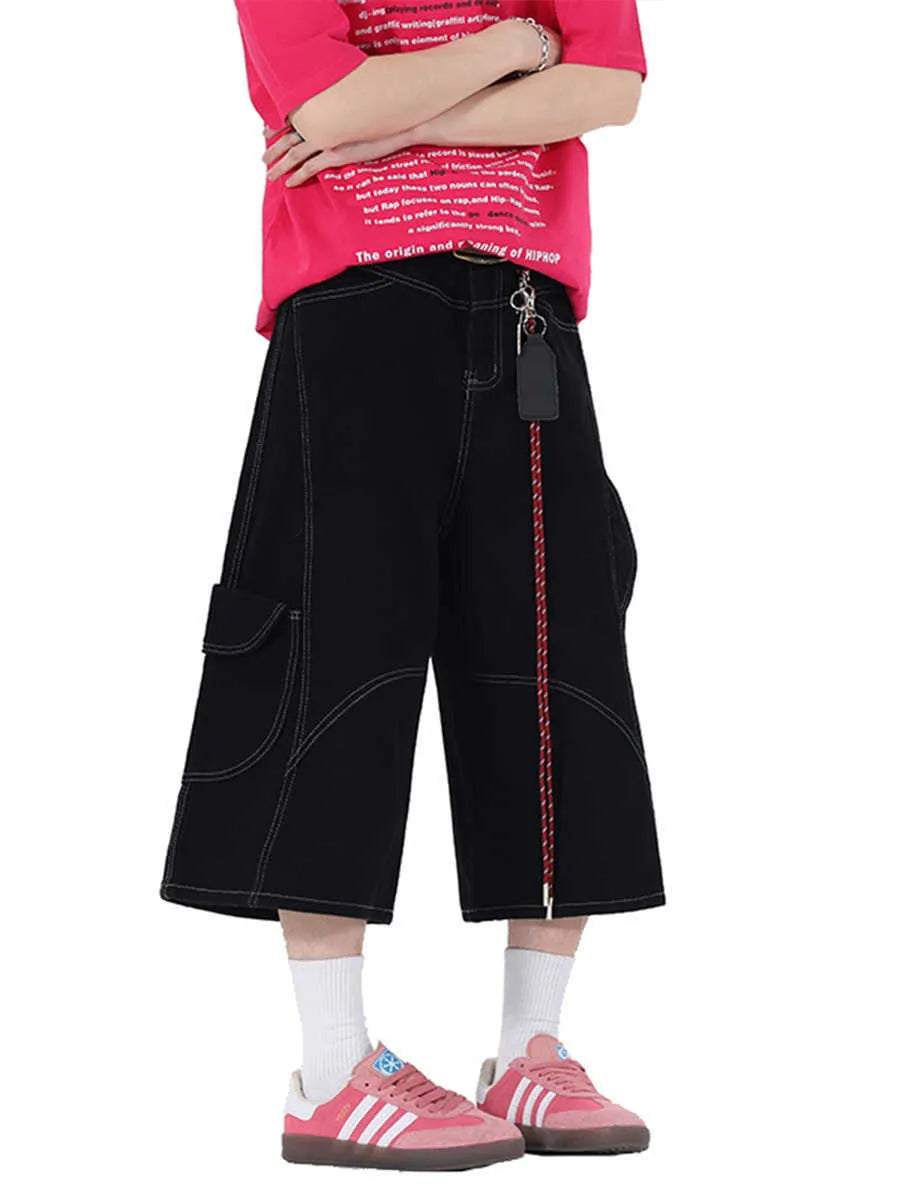 Retro denim multi-pocket workwear shorts in a wide leg cropped style, shown in red and black.