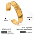 Stainless steel wings ring with open front design and electroplated metallic finish.