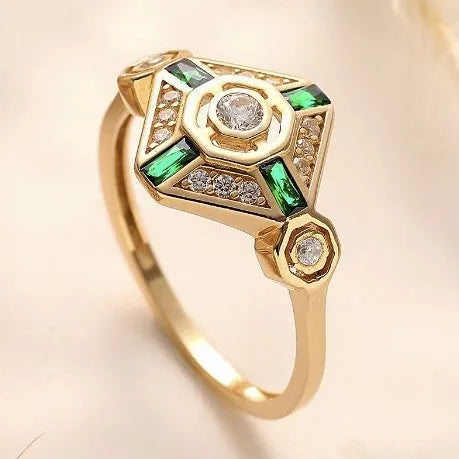 Square geometric ins style women's ring in lvzuan colour on a plain background.