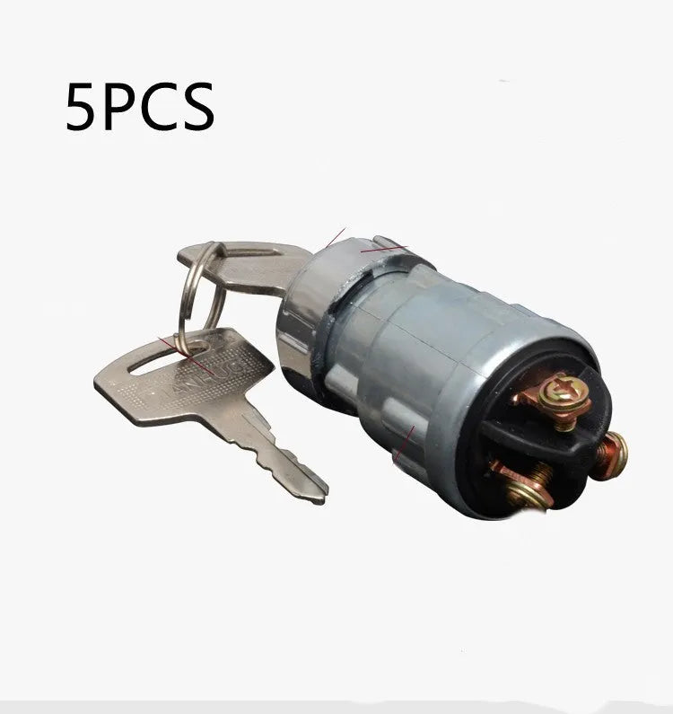 Copper ignition switch and key for trucks and forklifts on a white background.