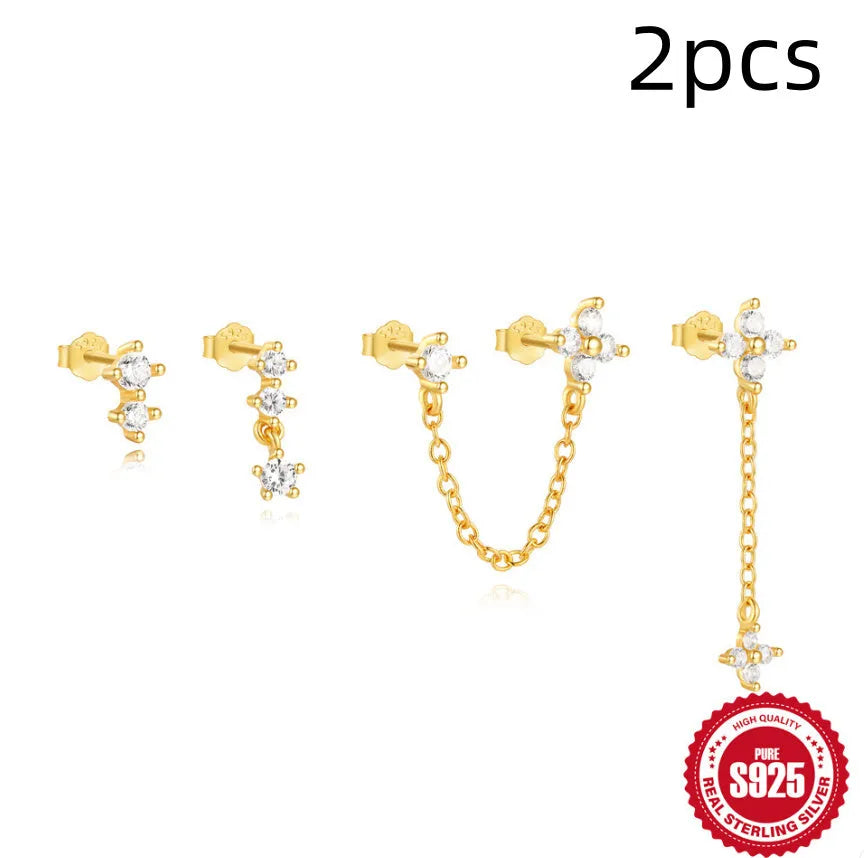 A pair of geometric clover petal earrings made of S925 sterling silver with a gold electroplated finish.