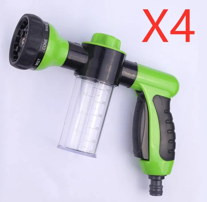 Green high pressure foam spray gun with adjustable nozzle for car washing and household cleaning.