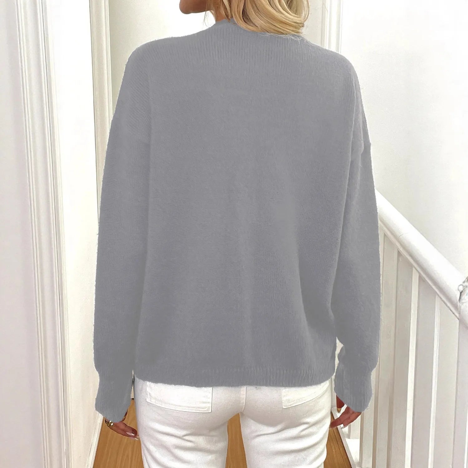 Women's irregular street hipster sweater coat in deer plush fabric with long princess sleeves available in black and grey