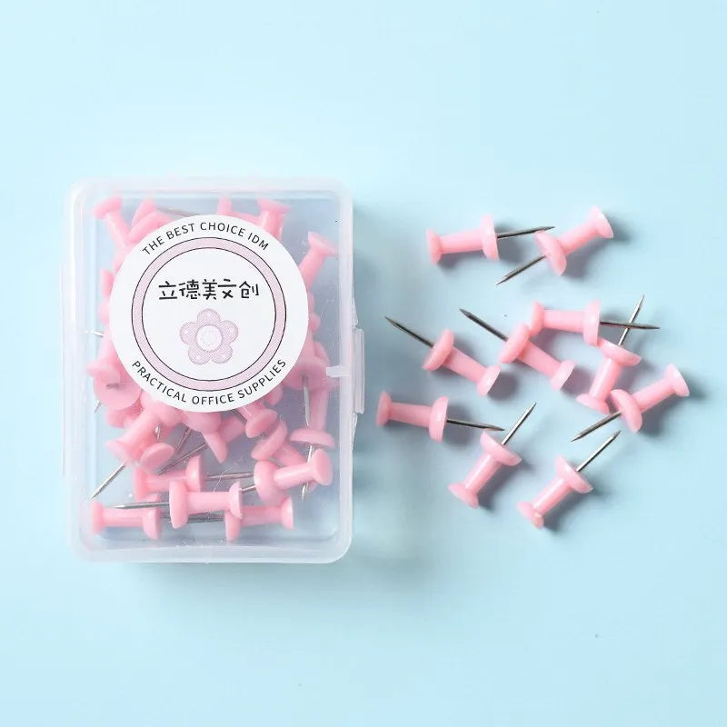 Box of plastic push pins in macaron colours - cherry blossom pink, mint green and lavender