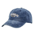 Retro washed distressed embroidered peaked cap with adjustable strap on a conical crown.