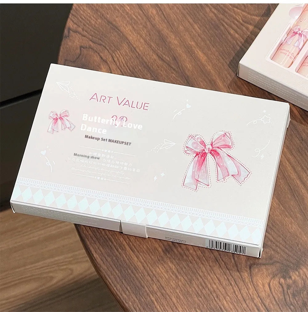 Butterfly Box makeup set with four matte lip muds, powder blusher compact and necklace in pink