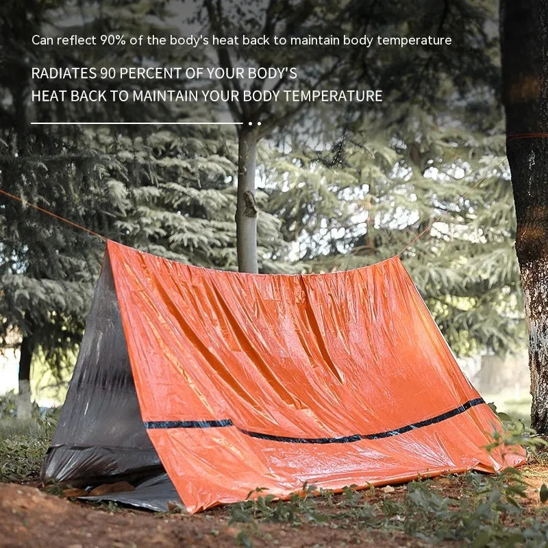 Portable orange emergency tent with sleeping bag and whistle for disaster relief camping