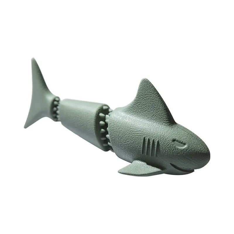 Blue rubber shark dog toy with conch shell texture design for chewing play