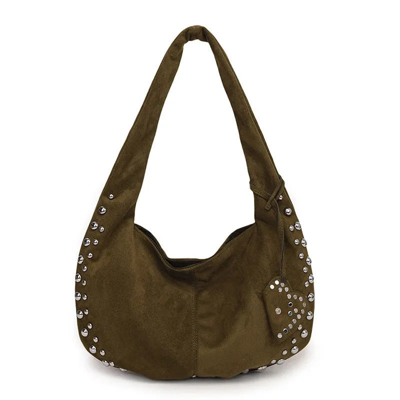 Soft plush retro tote handbag for women in a choice of colours, shown with strapless underarm carry.
