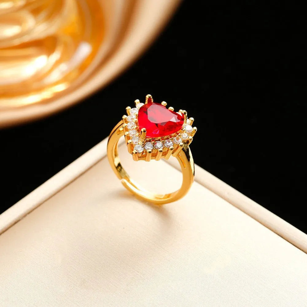 Women's titanium steel jewellery set with heart-themed mixed gem pendants in gold red colour