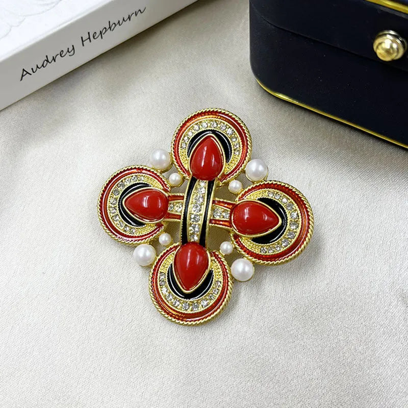 Close-up of a vintage zinc alloy baroque cross brooch with crystals, showing one of eight available colour styles.